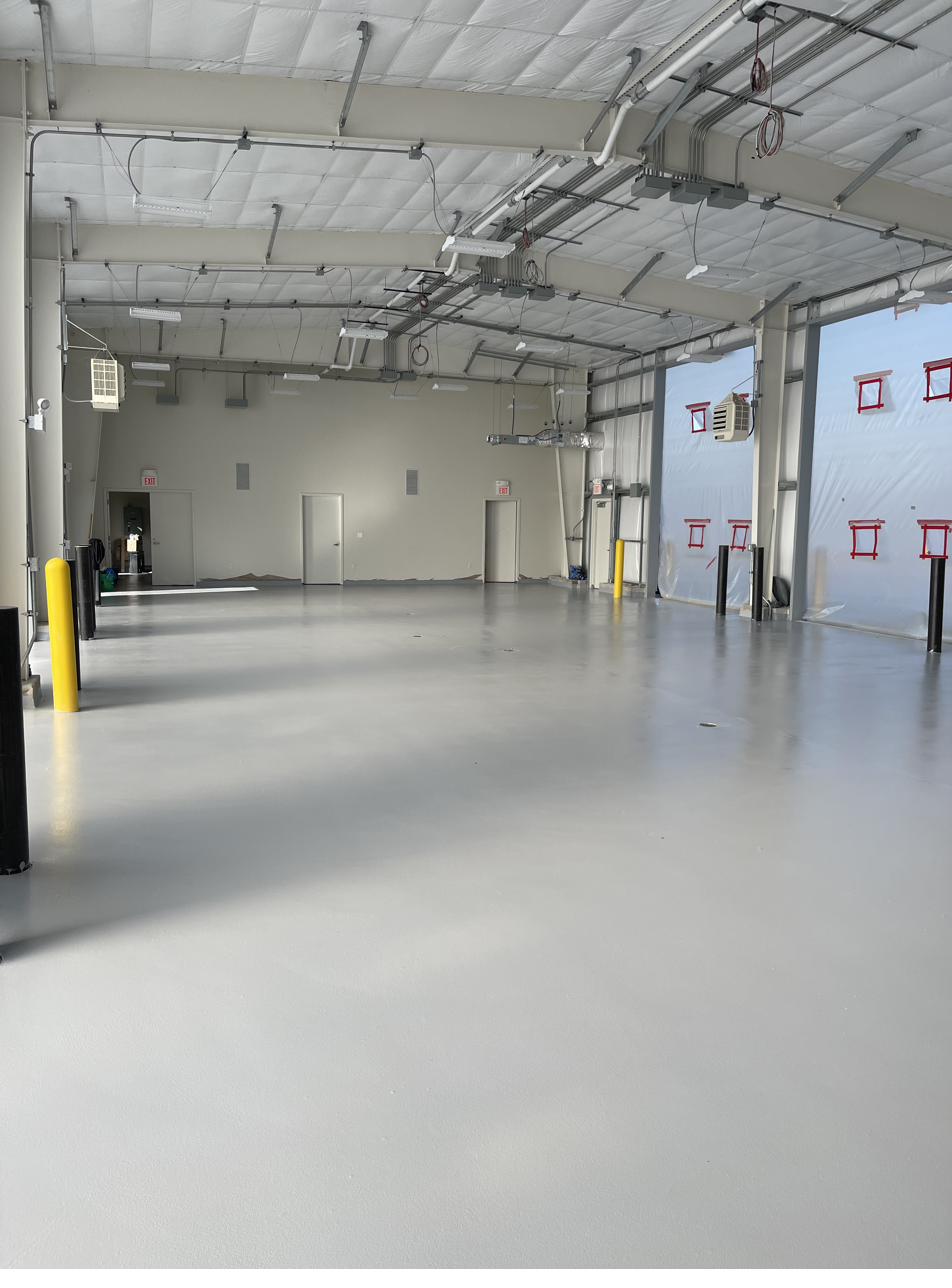 Textured gray metallic epoxy floor coating close up